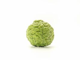 Fresh bergamot fruit isolated on white background with clipping path. Close-up photo. Healthy foods concept photo
