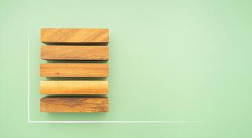 Top view of five empty wooden blocks with line effect isolated on a green background. Space for text photo