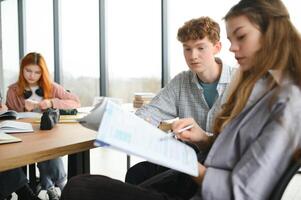 Students studying in library or classroom photo