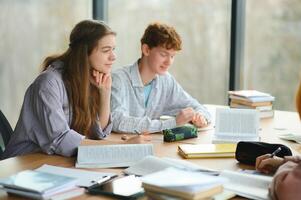 Students studying in library or classroom photo