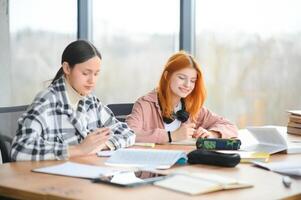 Students studying in library or classroom photo