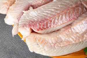 fillet raw white fish cod or halibut fresh meal food snack on the table copy space food background rustic top view photo