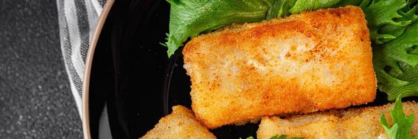 fish sticks fish in batter fresh meal food snack on the table copy space food background rustic top view Pescetarian diet photo