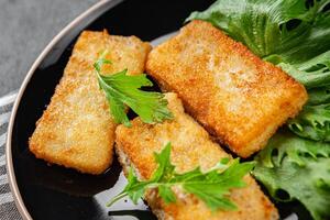 fish sticks fish in batter fresh meal food snack on the table copy space food background rustic top view Pescetarian diet photo