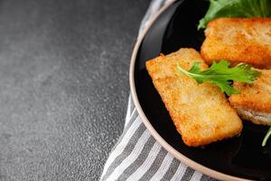 fish sticks fish in batter fresh meal food snack on the table copy space food background rustic top view Pescetarian diet photo