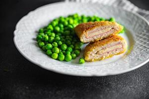 meat cutlet cordon bleu chicken, cheese, bacon meal snack on the table copy space food background photo