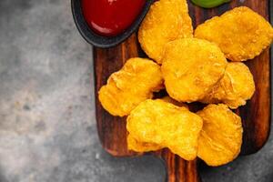 chicken nuggets deep fried meat meal food snack on the table copy space food background rustic top photo