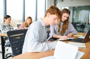 Students studying in library or classroom photo