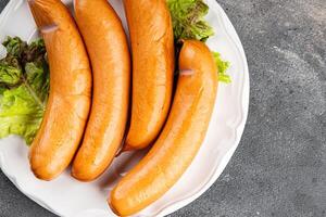 sausages meat pork or chicken, turkey fresh meal food snack on the table copy space food background rustic top view photo