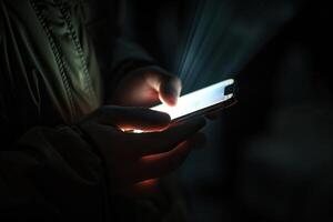 Bright light from a smartphone in a man's hands in the dark. Generated by artificial intelligence photo