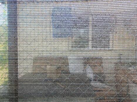 Installation of mosquito netting photo