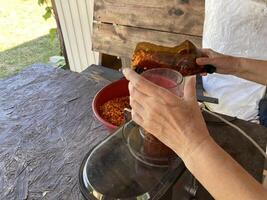 Production of sea buckthorn juice from berries photo