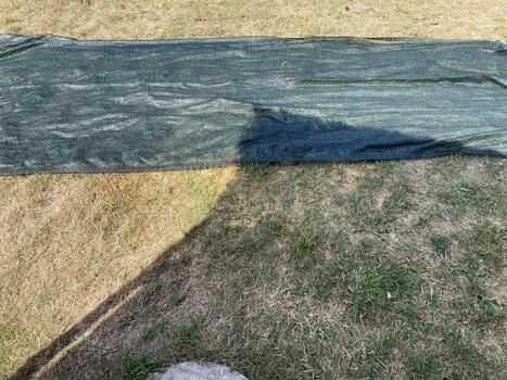 Installation of mosquito netting photo