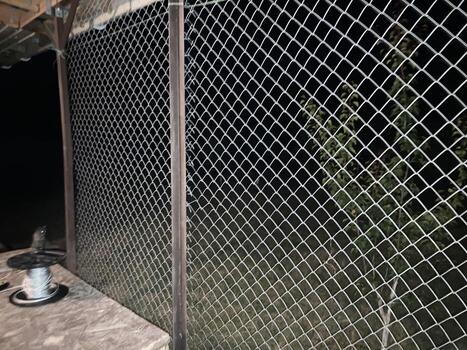 Installation of mosquito netting photo