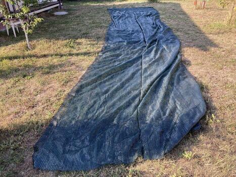 Installation of mosquito netting photo