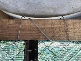 Installation of mosquito netting photo