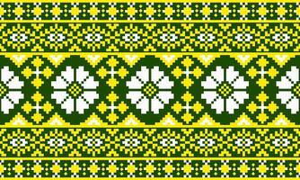 a detailed fabric pattern composed of pixel designs ,white and yellow flowers ,yellow and white square on green background. vector