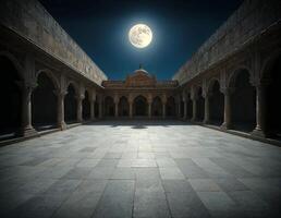 a full moon shining brightly on the night sky over an empty courtyard photo