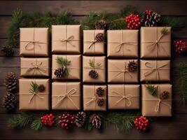 Christmas gift boxes wrapped in brown kraft paper and tied with string. photo