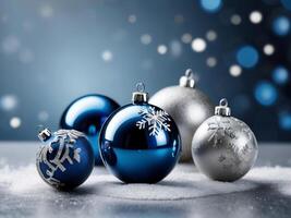 Luxurious silver and blue christmas balls placed on a snowy white surface on a blue backdrop, Christmas balls, Christmas background photo