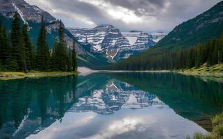 Snow Capped Peaks Reflecting on Clear Waters photo