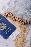 Conceptual background for travel with passport, magnifying glass, world map and money photo