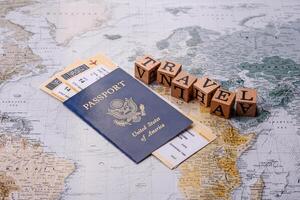 Conceptual background for travel with passport, magnifying glass, world map and money photo