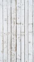 White wood planks with a rustic texture in natural lighting photo