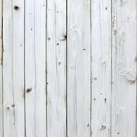 Whitewashed wood planks showing natural grain and knots in daylight photo