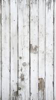 Weathered white wooden planks with an aged texture in a rustic setting photo