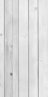 Textured white wood planks arranged in parallel formation indoors photo