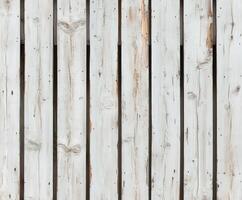 Lightly weathered white wooden planks with visible grain detail photo