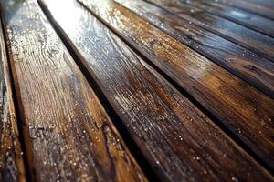 Wet wood decking glistening under afternoon sunlight photo