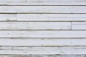 Textured white wood planks used in rustic interior design settings photo