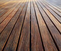 Wood decking with rich color and texture under soft natural light photo