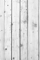 White wood planks with a rustic texture in a bright interior setting photo