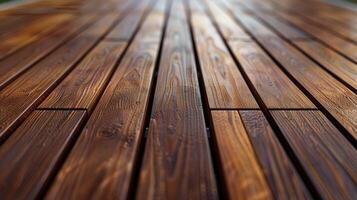 Close-up view of rich wood decking in a sunlit outdoor setting photo