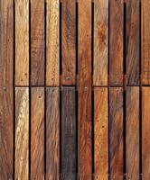 Wooden decking with varied textures and tones in natural light photo