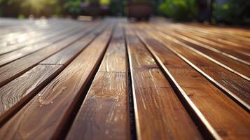 Close-up of gleaming wood decking in a sunlit garden setting photo