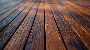 Wet wood decking with rich textures and warm tones in sunlight photo