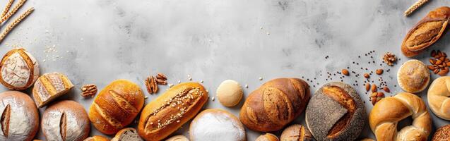 Freshly baked bread assortment displayed on a stone countertop photo