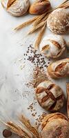 Freshly baked artisan bread with grains on a rustic surface photo