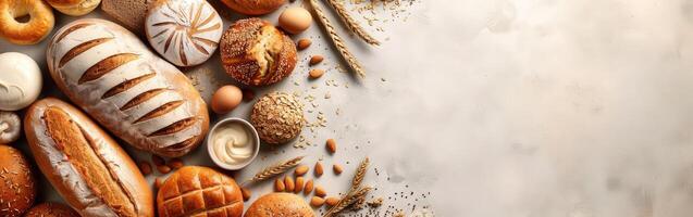 Freshly baked bread assortment on a countertop with empty space photo