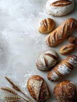 Freshly baked artisan bread on a rustic table with copy space photo