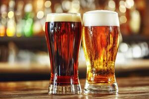 Two glasses of dark and light beer on a rustic bar counter photo