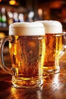 Beer mugs with foam on a wooden table in a lively bar photo