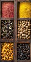 Colorful assortment of Indian spices arranged in wooden boxes photo