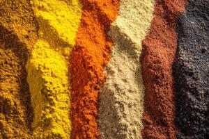 Vibrant display of colorful Indian spices in a market setting photo