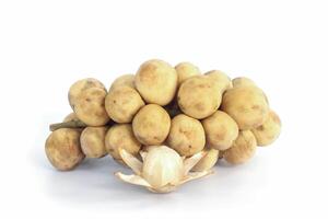 Bunch southern langsat fruit and peeled isolated on white background. photo