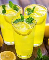 Refreshing green mint lemonade served in chilled glasses with ice photo